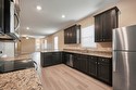 Beautiful wood cabinetry and granite countertops in your chef-ready kitchen!